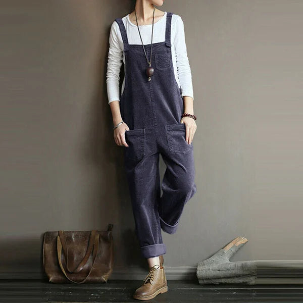 Back view of the Lyra jumpsuit on a model, illustrating the overall design and the graceful flow of the fabric.