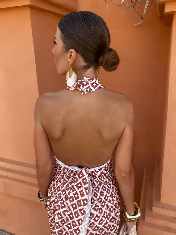 Side profile of the woman in the elegant off-shoulder set, showcasing the flow of the fabric and flattering fit.