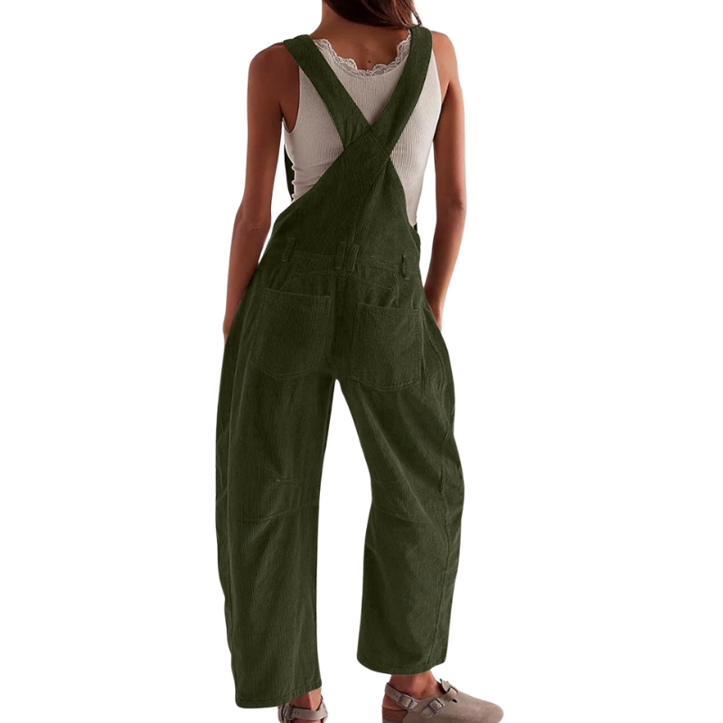 Full body shot of a model confidently posing in wine red Soraya relaxed fit overalls, perfect for summer.