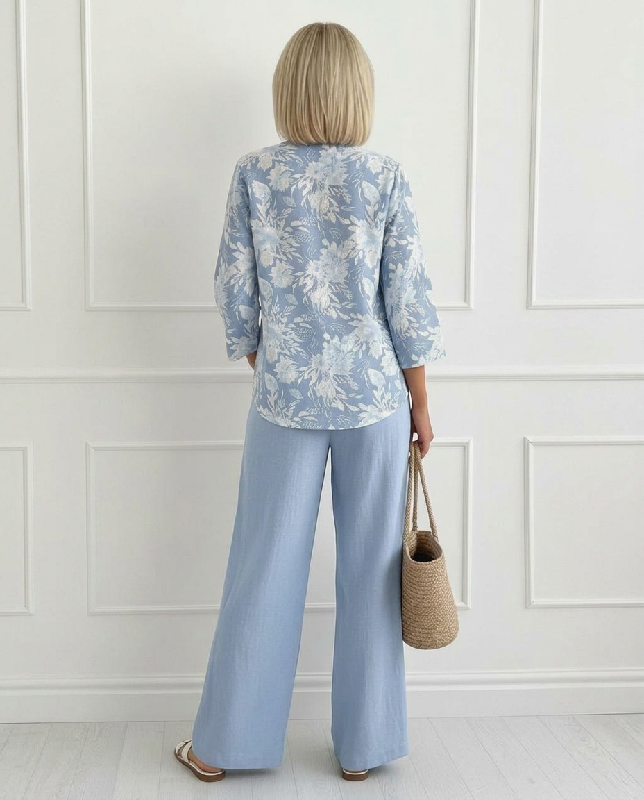 Stylish woman relaxing outdoors, wearing the Adira set, perfect for a casual warm-weather ensemble.