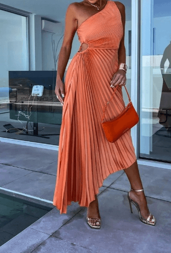 Flat lay of the black Ainsley one-shoulder pleated midi dress, showcasing the fabric texture and design details.
