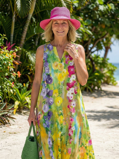 Side profile of the Seraphina maxi dress, highlighting its elegant drape and sleeveless design in motion.