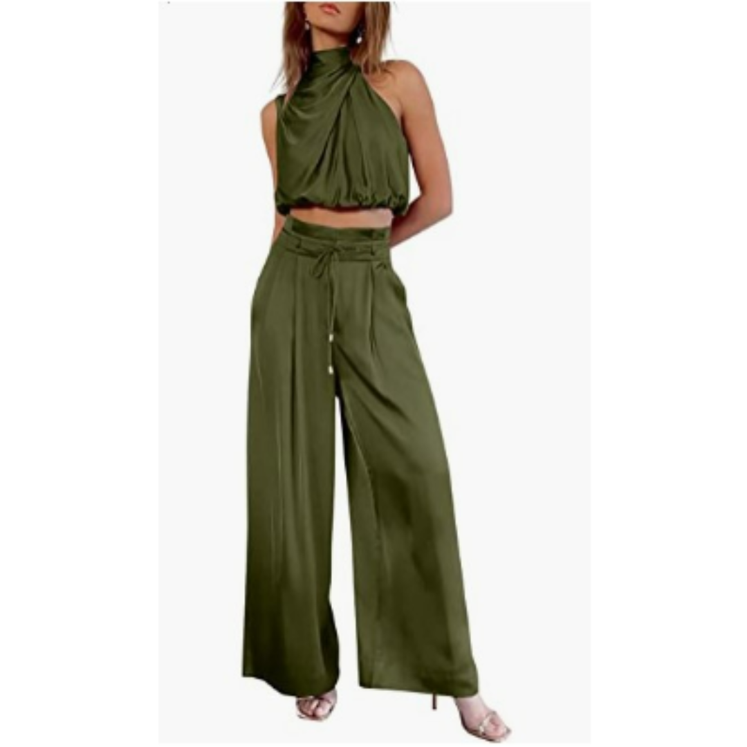 Product flat lay of a folded apricot Seraphina jumpsuit, highlighting its compact and travel-friendly nature.