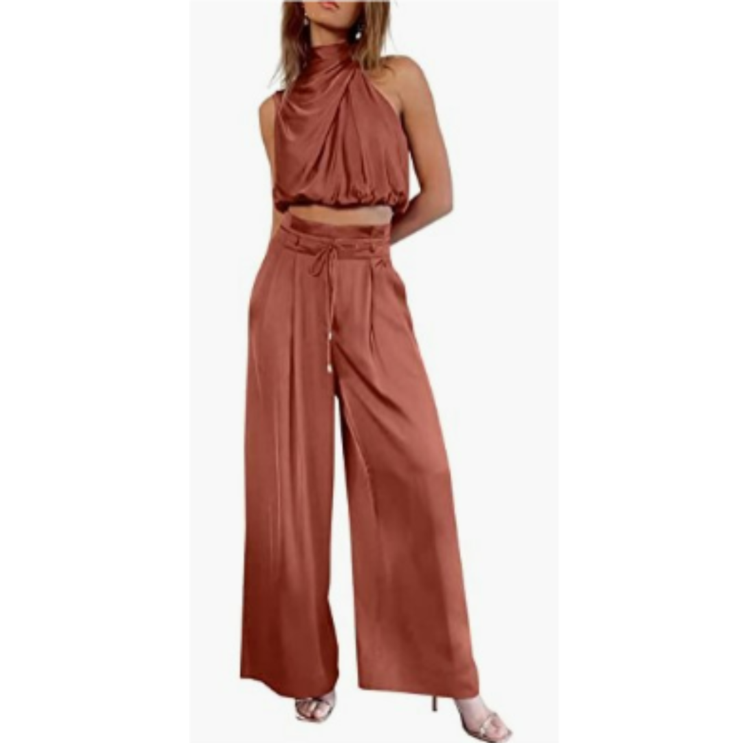 Lifestyle image of a woman relaxing in a Seraphina jumpsuit, emphasizing the ultimate comfort and ease of wear.