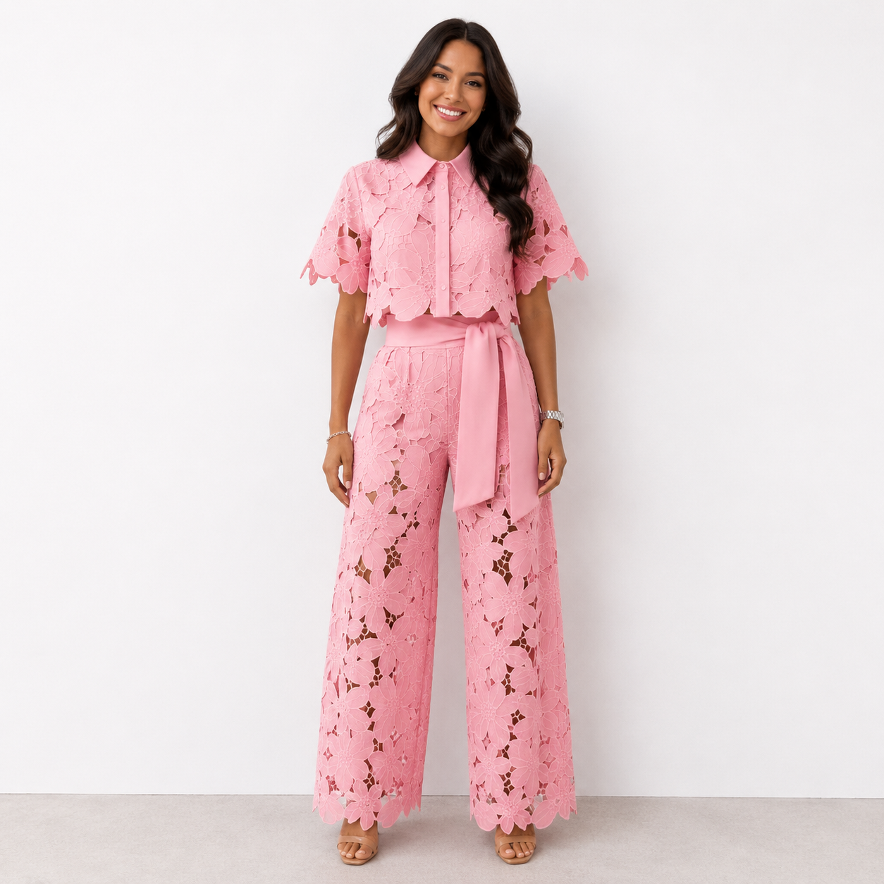 Back view of the Aria two-piece set in pink, showing the relaxed fit of the wide-leg trousers and cropped top.