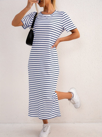Close-up detail of the soft ribbed fabric and classic stripe pattern on the comfortable jersey midi dress.