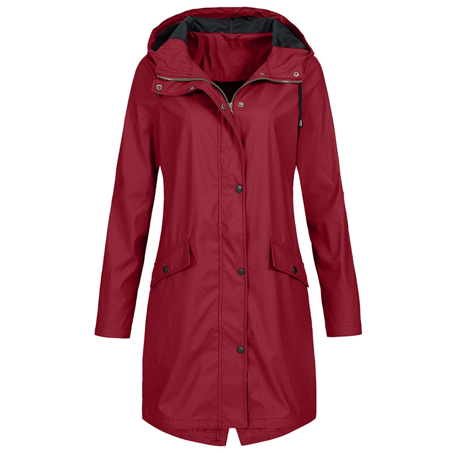 A woman smiling while wearing the red women's waterproof jacket, enjoying a light rain shower in an urban setting.