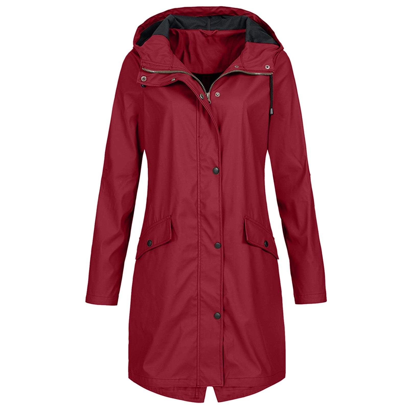 A woman smiling while wearing the red women's waterproof jacket, enjoying a light rain shower in an urban setting.