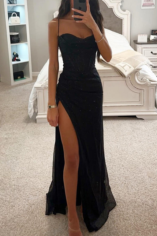 Front view of a model wearing the Ayla black sequin maxi dress, showcasing the draped neckline and high side split.