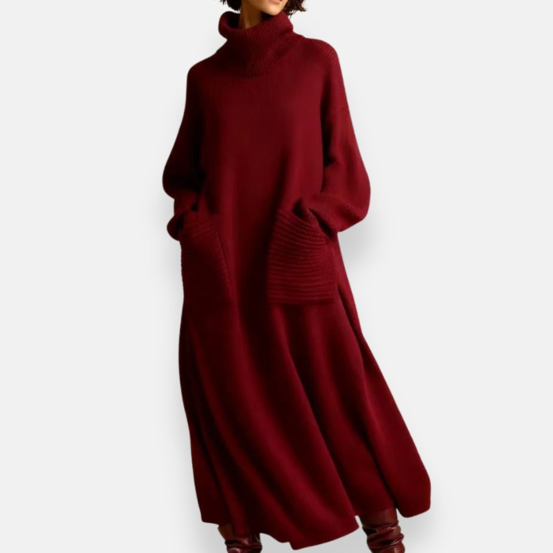 Close-up detail of the soft knit fabric and high neckline of the Bianca cozy knit high-neck dress.