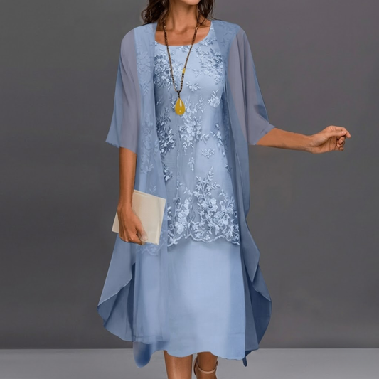 Front view of the Thalassa elegant dress set in sky blue, showcasing its relaxed fit and round neckline.