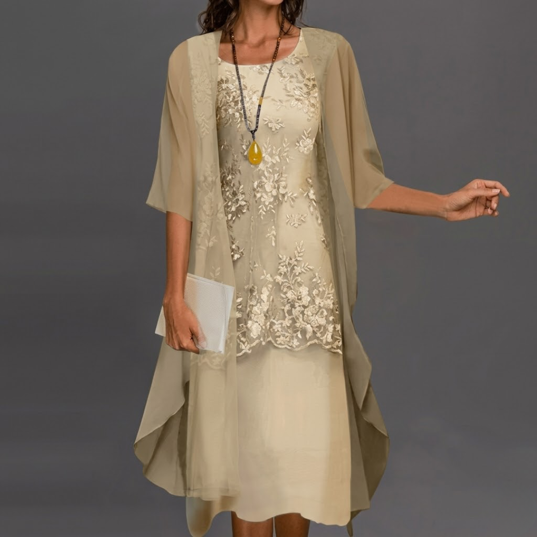 Close-up detail of the smocked waist and patchwork accents on the elegant dress set, highlighting the fabric texture.