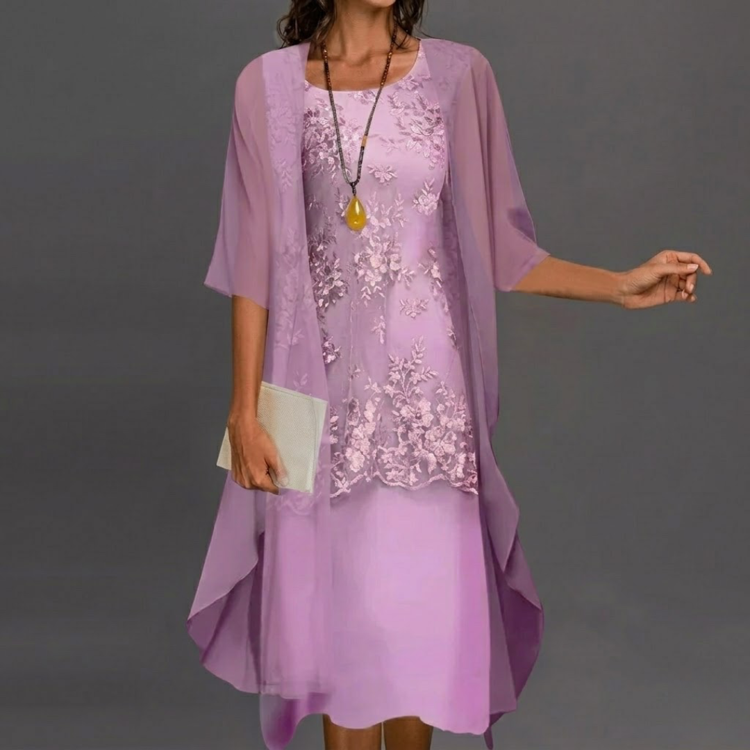 Lifestyle shot of a woman wearing the yellow Thalassa elegant dress set, styled with sandals for a casual outdoor look.