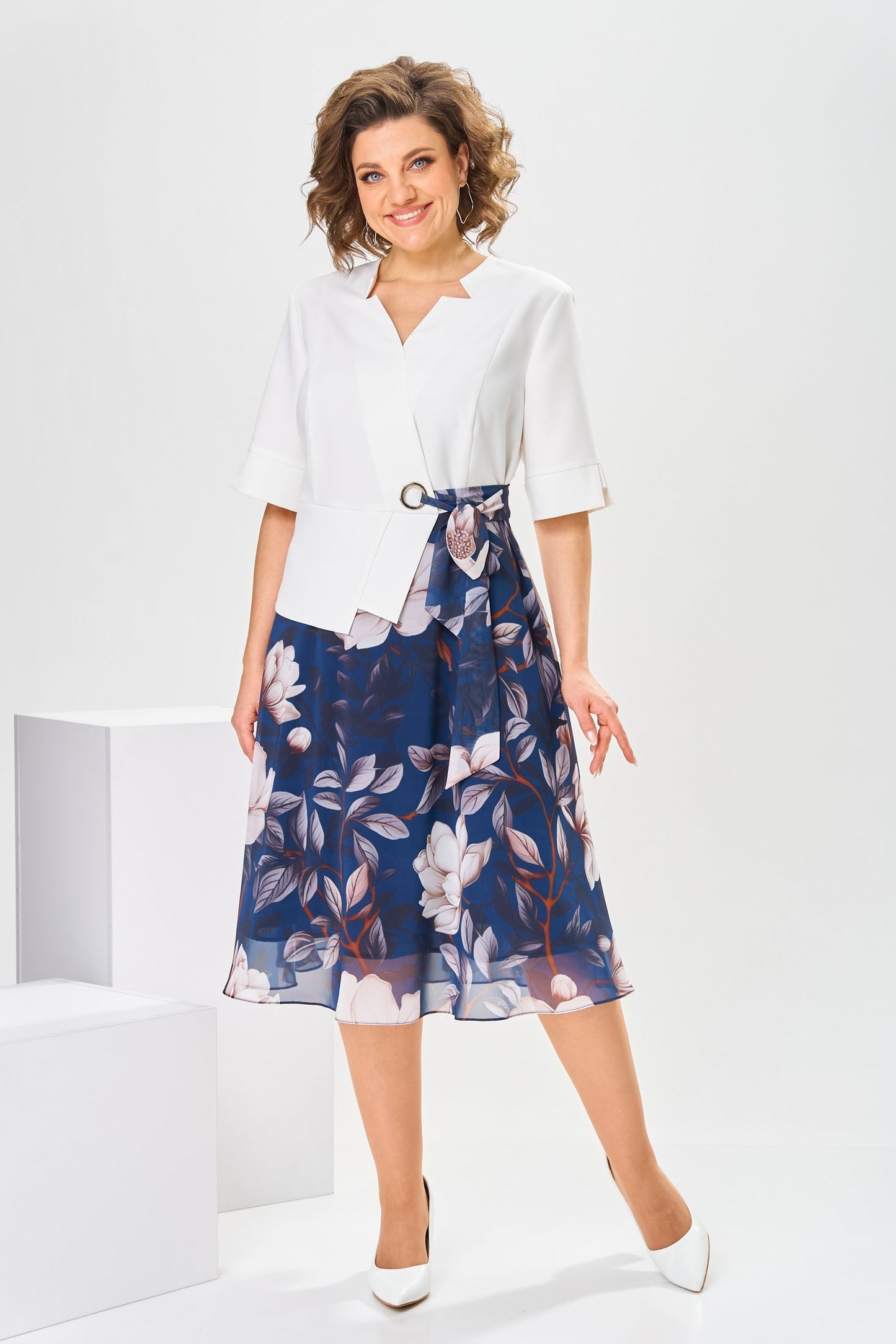 Front view of the Celeste flowy cotton-silk dress in a soft pink shade, showcasing its elegant drape.