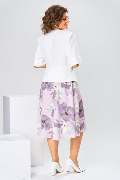 Another lifestyle image showing the versatility of the Celeste cotton-silk dress for various elegant occasions.