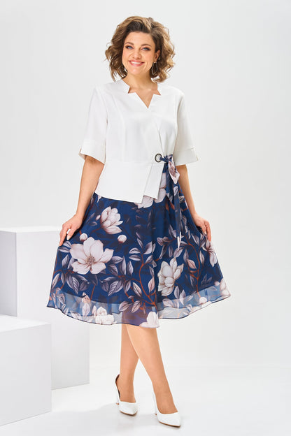 Side profile of a model wearing the Celeste cotton-silk dress, highlighting the graceful movement of the fabric.