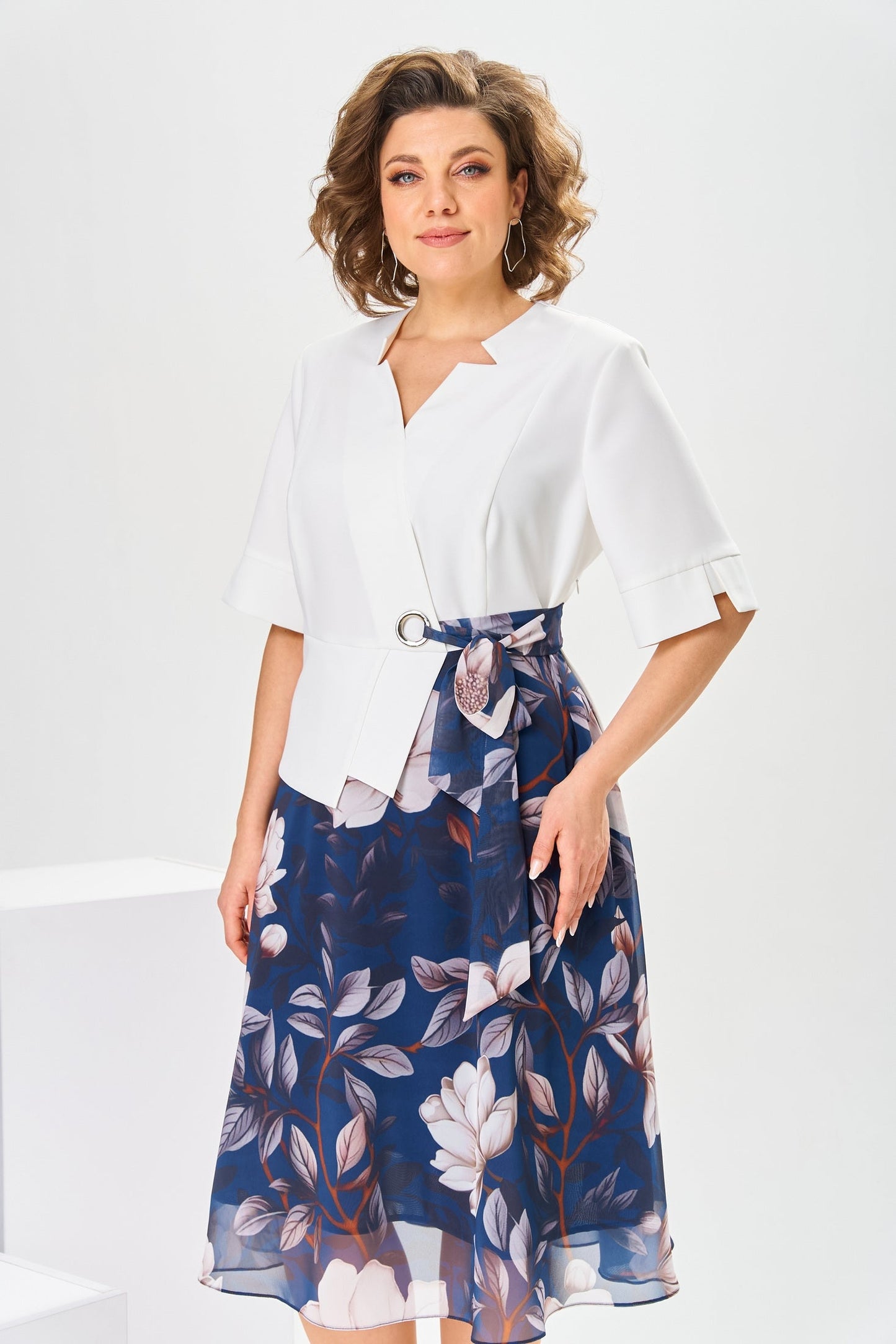 Close-up detail of the luxurious cotton-silk blend fabric of the Celeste dress, showing its smooth texture.