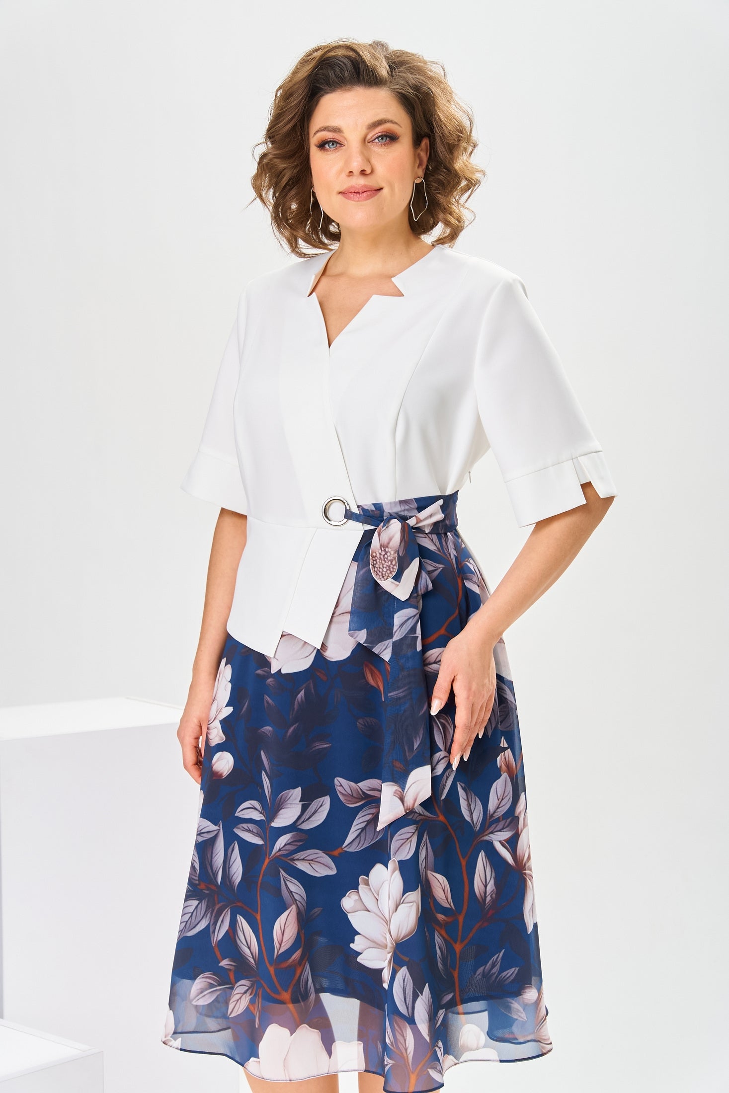 Close-up detail of the luxurious cotton-silk blend fabric of the Celeste dress, showing its smooth texture.
