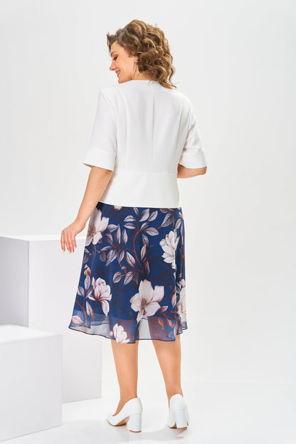 Lifestyle shot of someone enjoying a sunny day while wearing the light and airy Celeste cotton-silk dress.