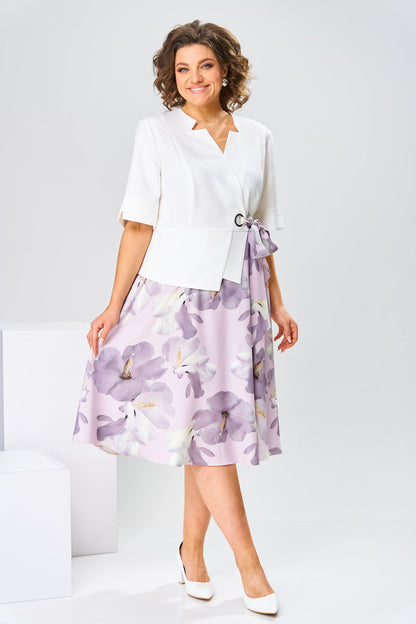 A full-length shot of the Celeste dress in a beautiful blue color, perfect for a chic daytime look.