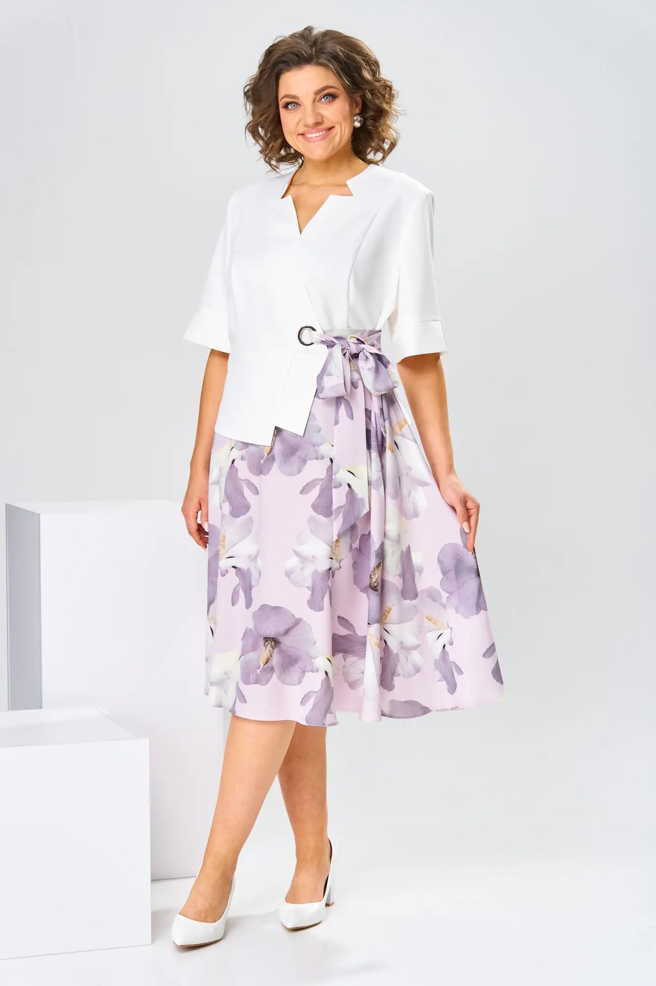 Detailed shot of the neckline and upper bodice of the Celeste flowy cotton-silk dress, showcasing its craftsmanship.