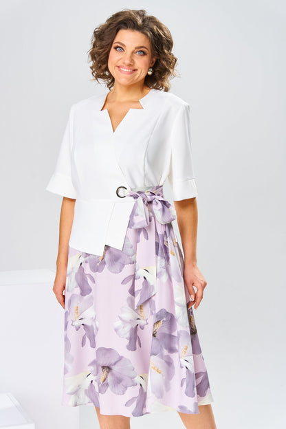 Model gracefully walking in the Celeste cotton-silk dress, illustrating its fluid silhouette and comfort.