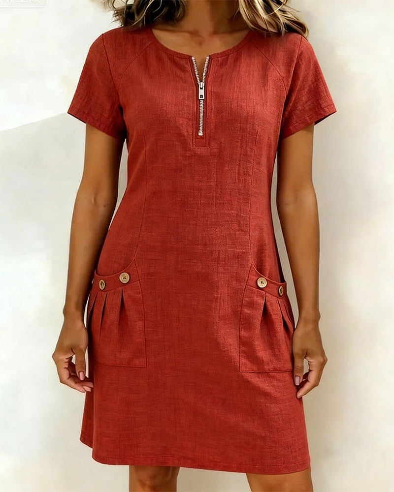 Close-up of the functional and stylish decorative pockets on the Clara short dress.
