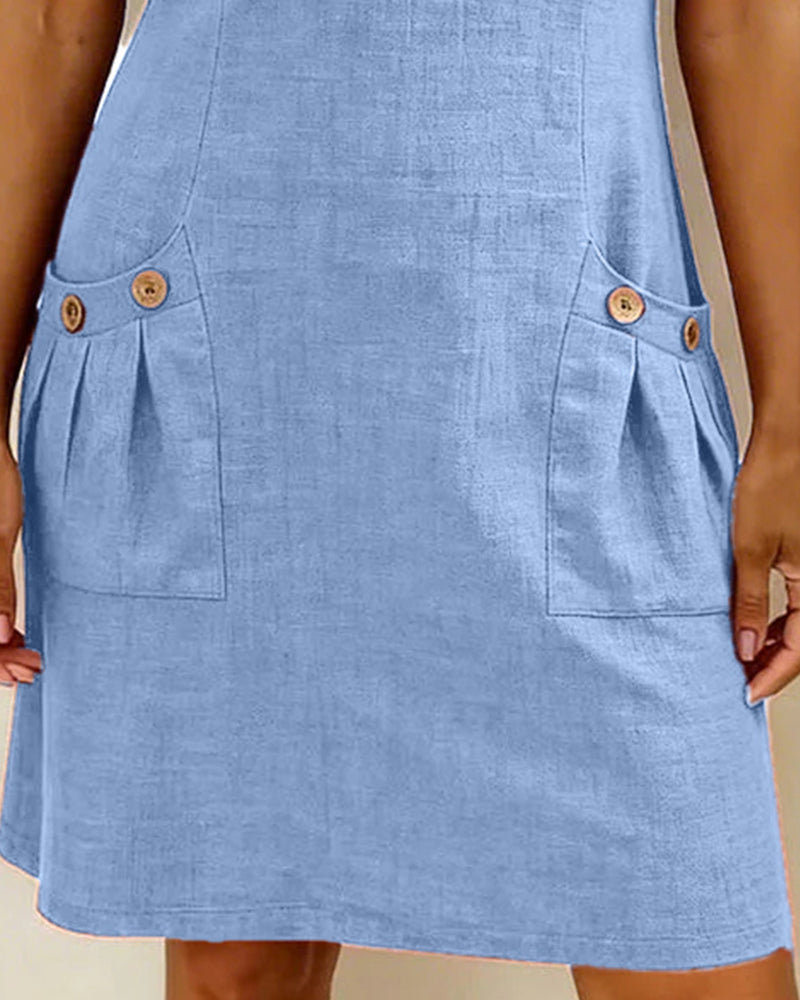 Close-up of the modern zip collar and decorative pocket detail on the Clara short dress.