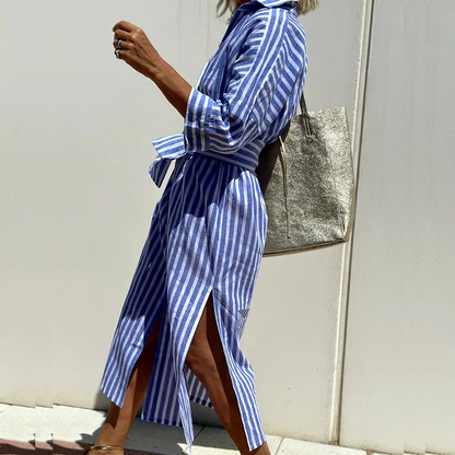 Back view of the Clara chic striped shirt dress, demonstrating its comfortable and flattering drape.