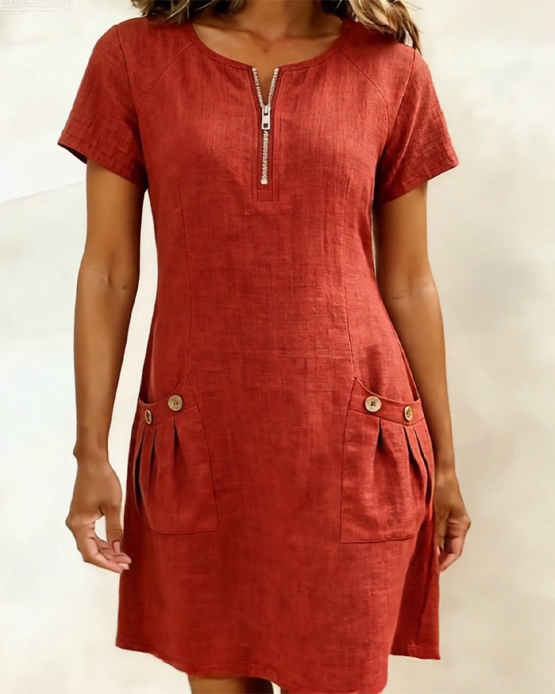 Detailed shot of the fabric texture and stitching on the Clara short dress.