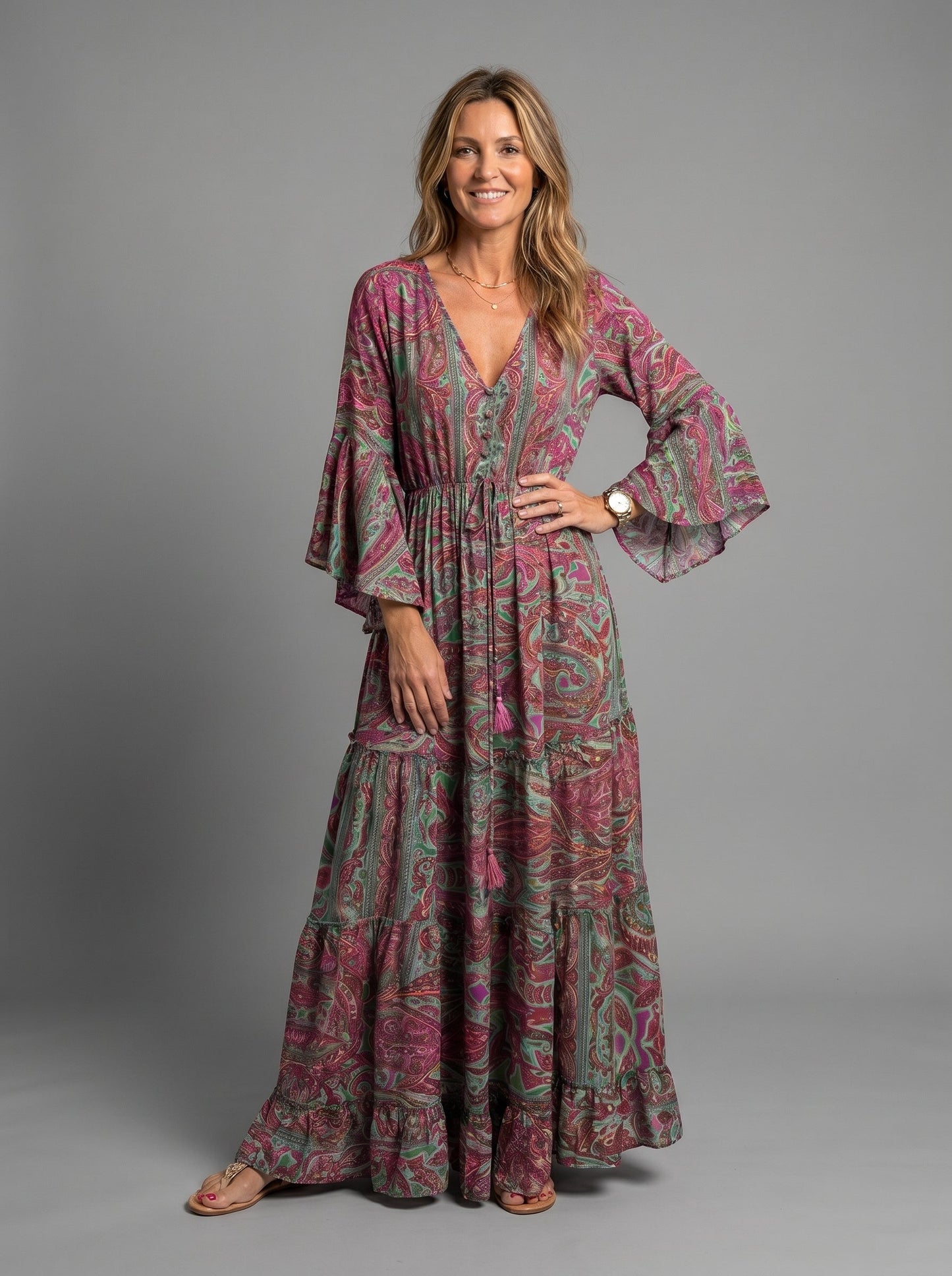Close-up of the fabric texture and color vibrancy of the floral print maxi dress.