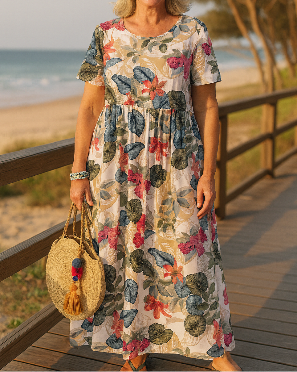 Front view of Eliza floral maxi dress in beige, showcasing its relaxed fit and elegant print.