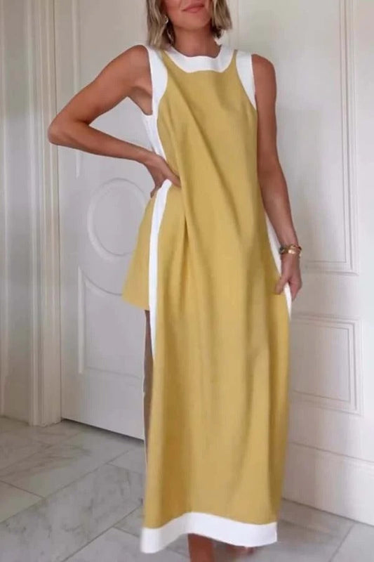 Front view of the Evelina yellow two-piece shorts set, showcasing the sleeveless top and calf-length shorts.