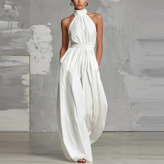 Front view of the Evie black wide-leg summer jumpsuit showcasing its elegant halter neckline.