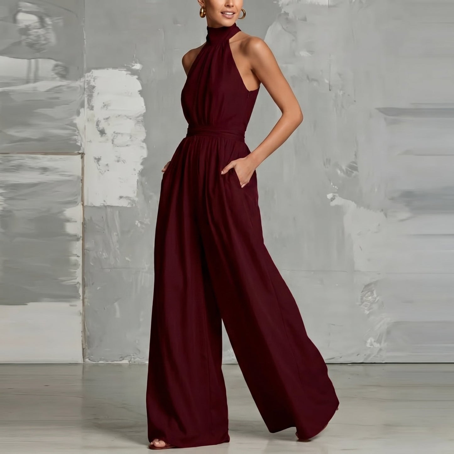 Close-up of the halter neckline design on the Evie blue wide-leg summer jumpsuit, showing refined feminine details.