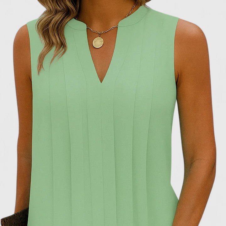 A model laughing while wearing the green elegant v-neck midi dress, reflecting its comfortable and versatile nature.