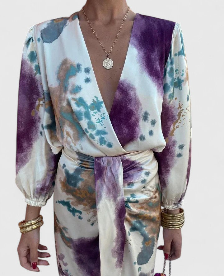 Side profile of the Fiona chic floral midi dress, highlighting the flattering cut and breathable fabric movement.