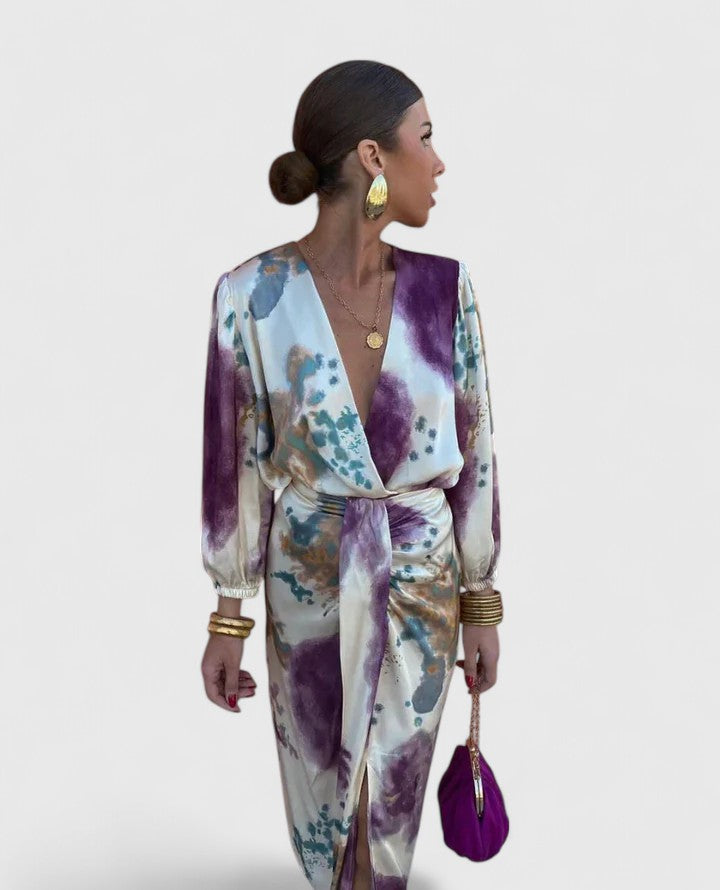 Close-up detail of the floral pattern and the quality of the fabric on the Fiona chic floral midi dress.