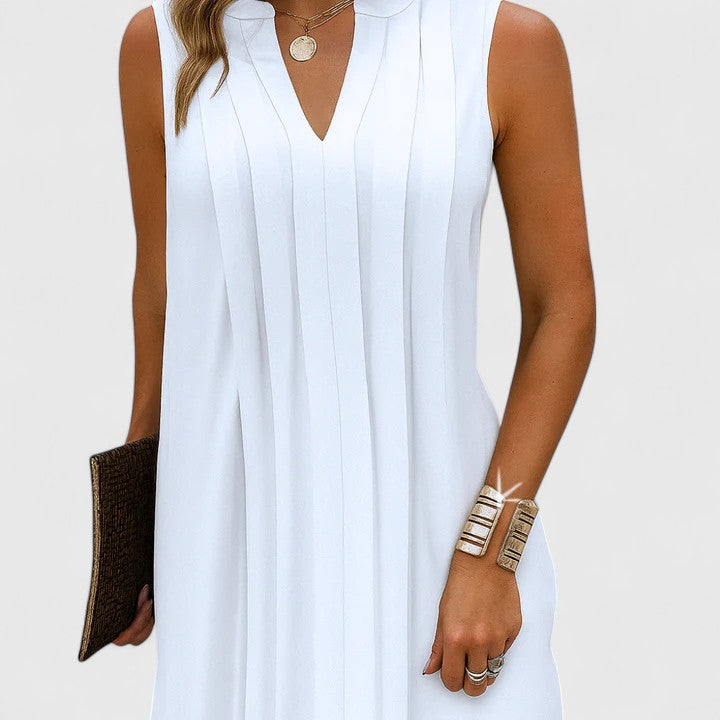 Front view of a white elegant v-neck midi dress, perfect for bright spring and summer days with its light hue.