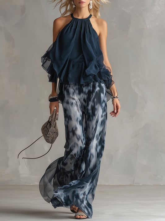 Front view of the navy blue chiffon top and printed wide-leg trousers set, showcasing its flowy elegance.