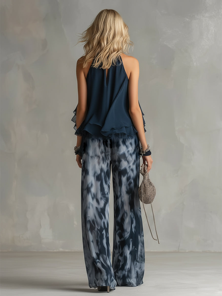 Back view of the printed wide-leg chiffon trousers, showing the comfortable and relaxed fit.