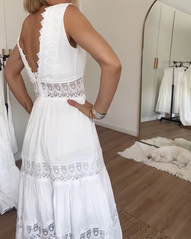Close-up of the intricate lace details on the neckline of the boho chic maxi dress.