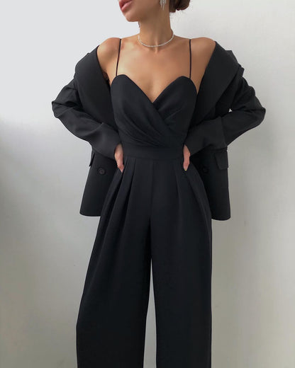 Front view of the Paloma adjustable straps jumpsuit in black, showcasing its sleek design.