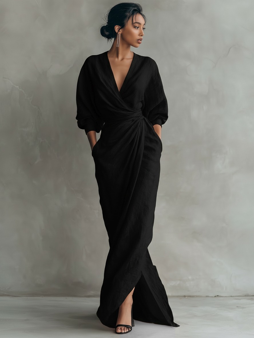 Stylized flat lay of the Marlowe maxi dress in brown, folded to show off the material and versatile design.