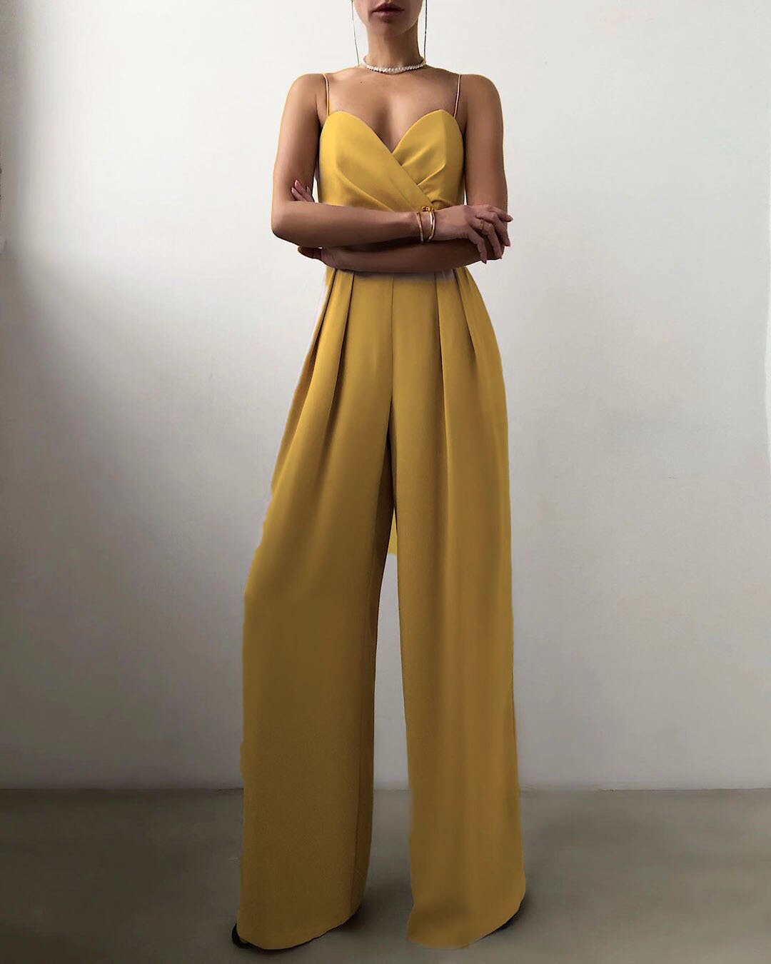 Flat lay of the Paloma adjustable straps jumpsuit, displaying all available color options.