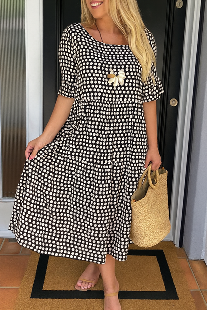 Close-up detail of the breathable fabric texture on the Kaelani chic midi dress.