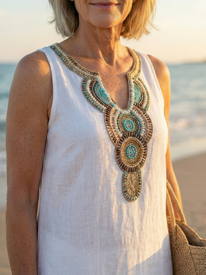 Back view of the sky blue Kalea midi dress, showing its clean lines and comfortable drape.