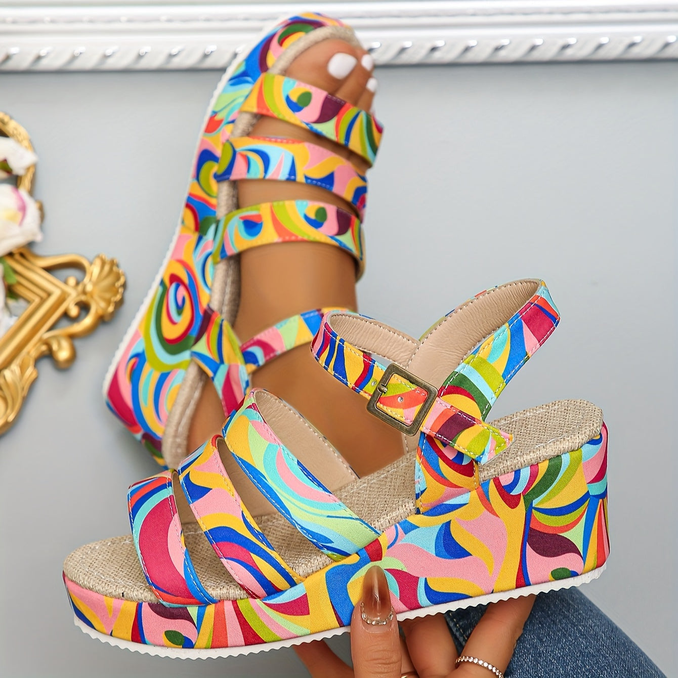Top-down perspective of the open-toe vibrant platform sandals, showcasing the full pattern on the straps.