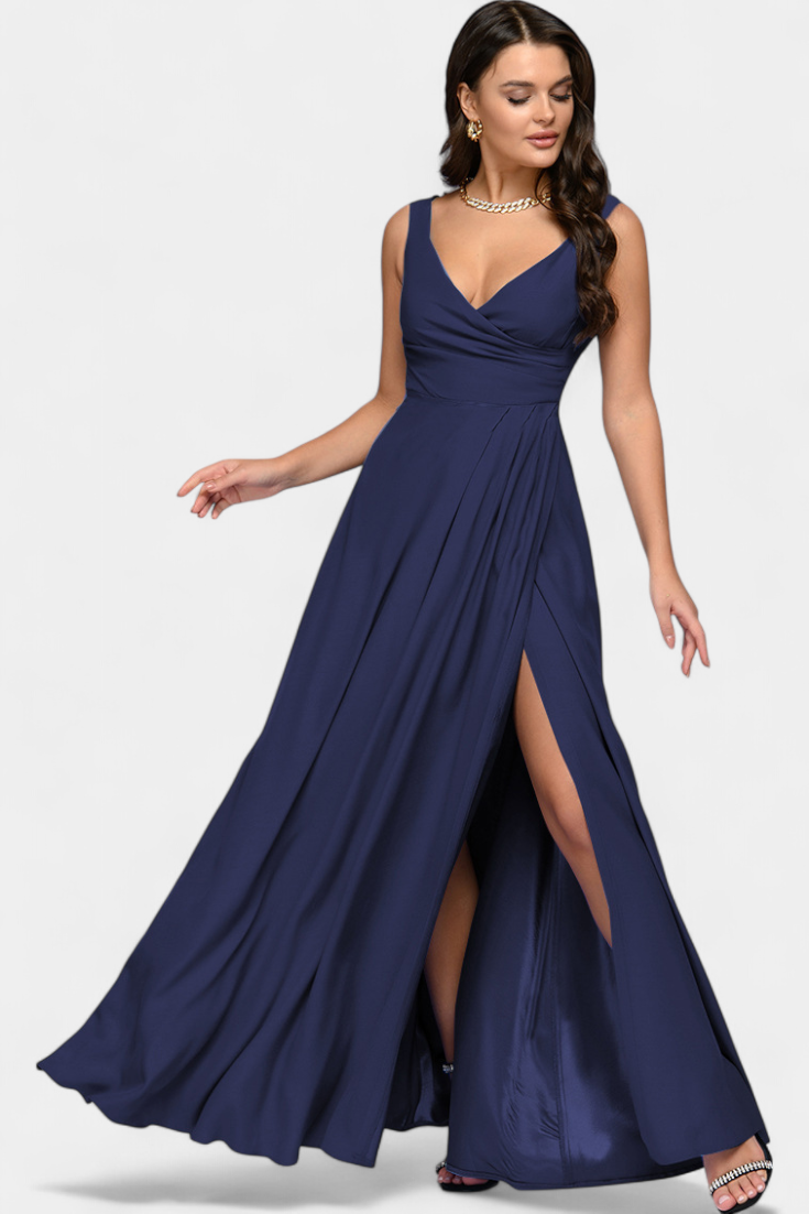 Lifestyle shot of the black elegant draped maxi dress at an evening event, exuding sophisticated charm.