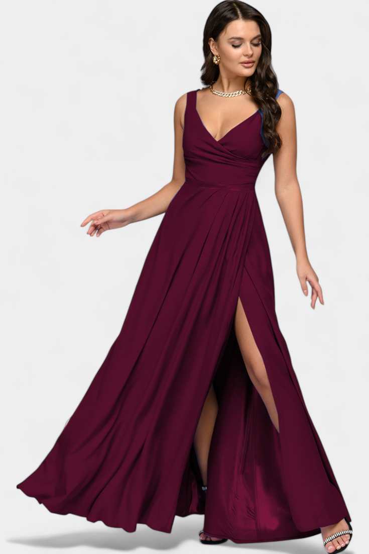 Close-up detail of the draped crossed neckline on the red Lila Draped Maxi Dress, showing fabric texture.